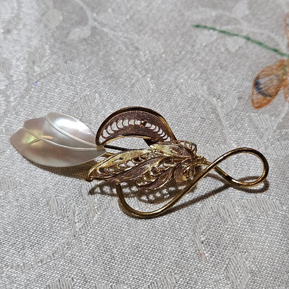 vintage whimsical coquette mother of pearl gold tone filigree brooch